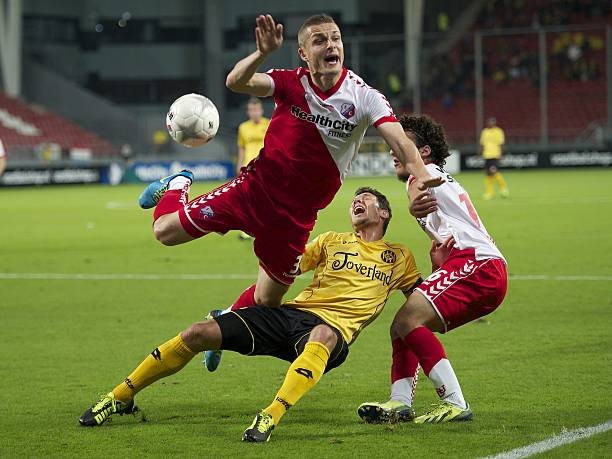 (L-R) Timothy Derijck of FC Utrecht, Mark Jan Fledderus of Roda JC, Yassin Ayoub of FC Utrecht during the Dutch Eredivisie match between FC Utrecht and Roda JC Kerkrade on September 28, 2013 at the Galgenwaard stadium in Utrecht, The Netherlands.(Photo by VI Images via Getty Images)