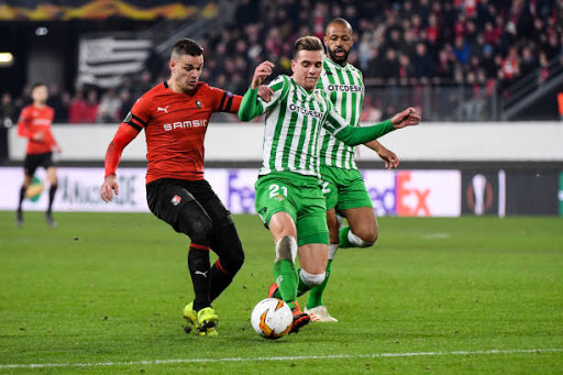 Hatem Ben Arfa of Rennes and Giovani Lo Celso of Real Betis during the UEFA Europa League Round of 32 First Leg match between Rennes and Real Betis at Roazhon Park on February 14, 2019 in Rennes, France. (Photo by Anthony Dibon/Icon Sport via Getty Images)